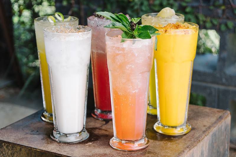 Tall glasses with liquids. 