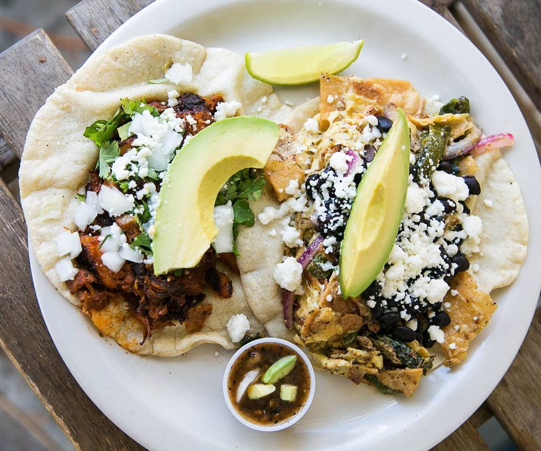 A plate of two tacos.