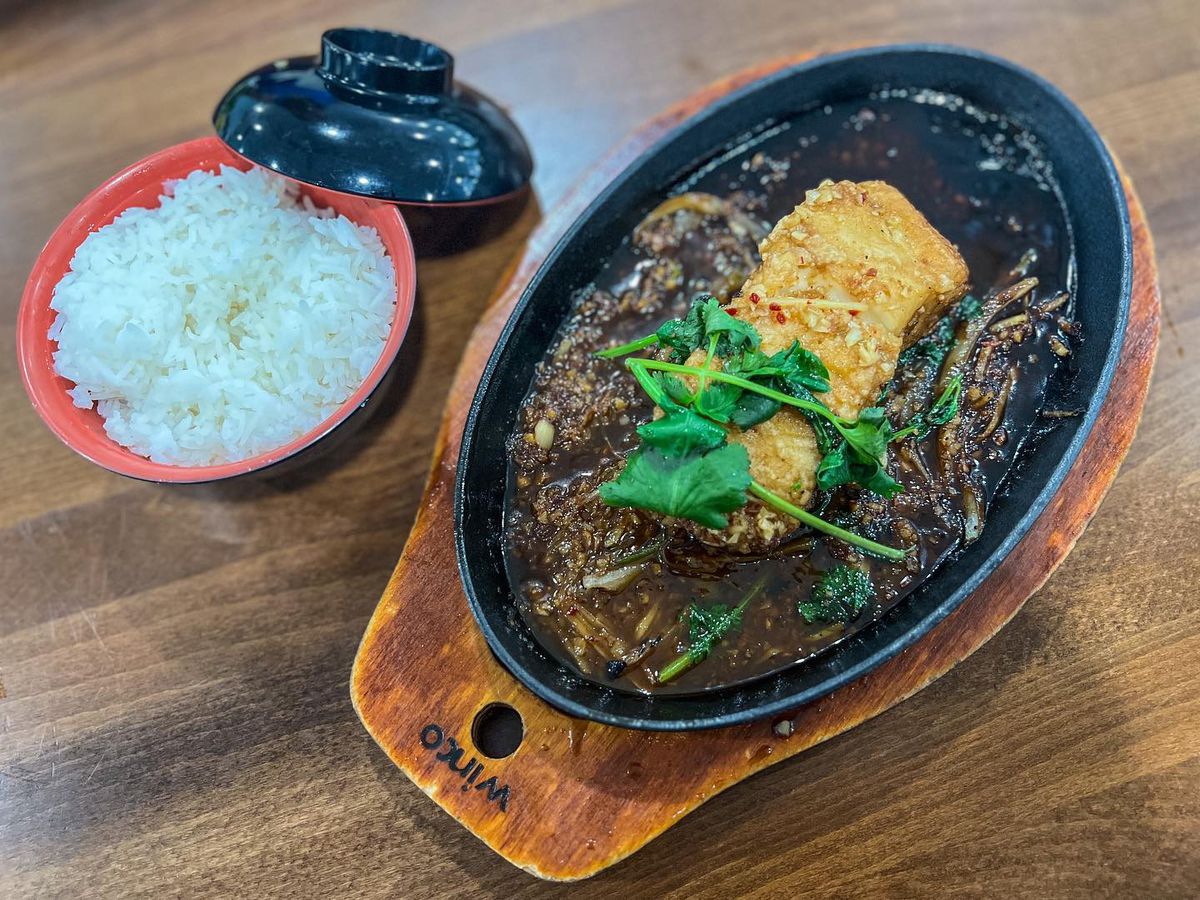 Fried fish on a cast-iron pan.