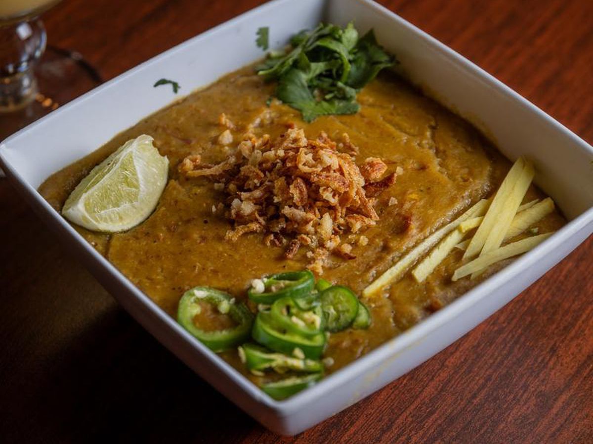 A square bowl of creamy meat.