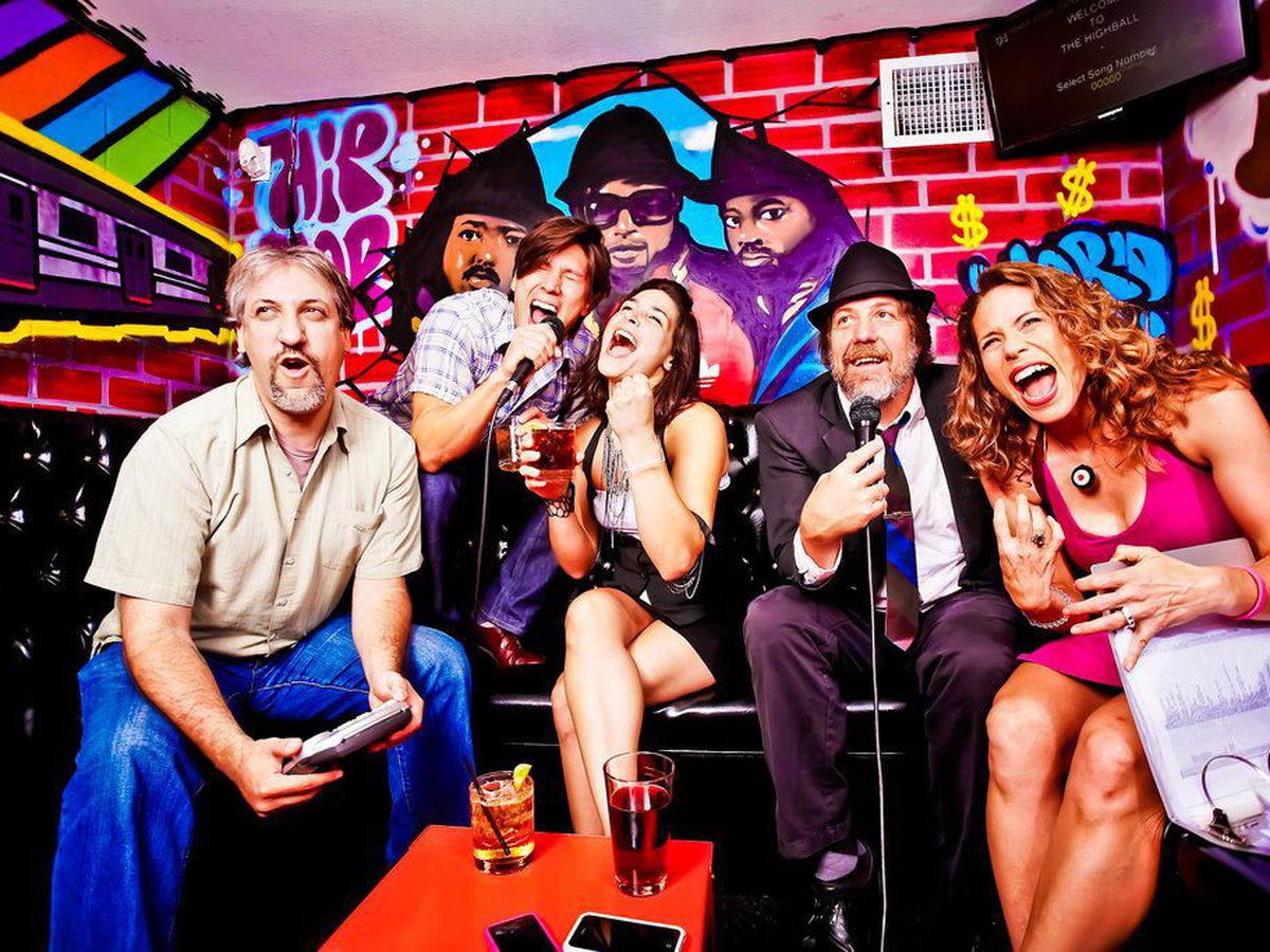 People singing in a room.