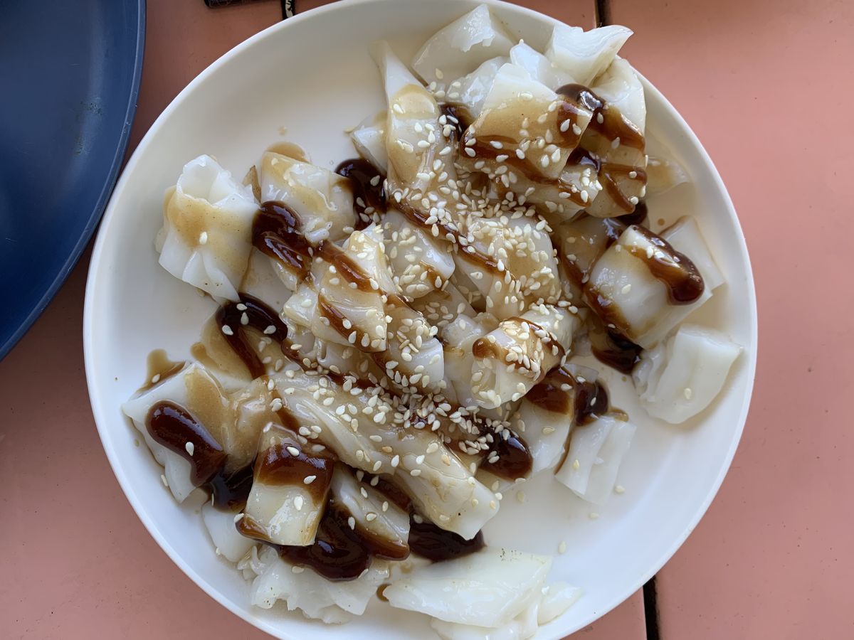 Rice rolls with a brown sauce.