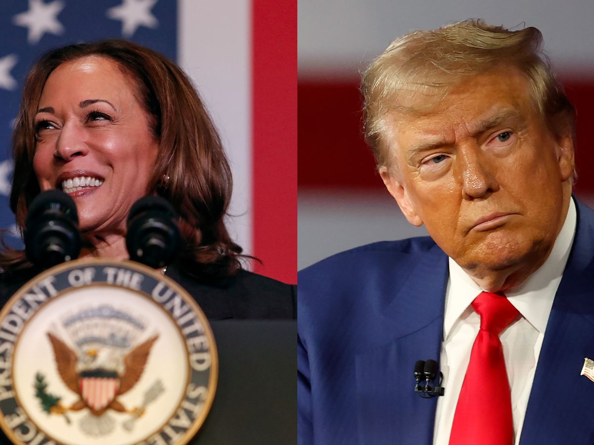 A woman in front of an American flag and behind a podium with a seal reading “vice president of the United States,” and a man in front of an American flag. 