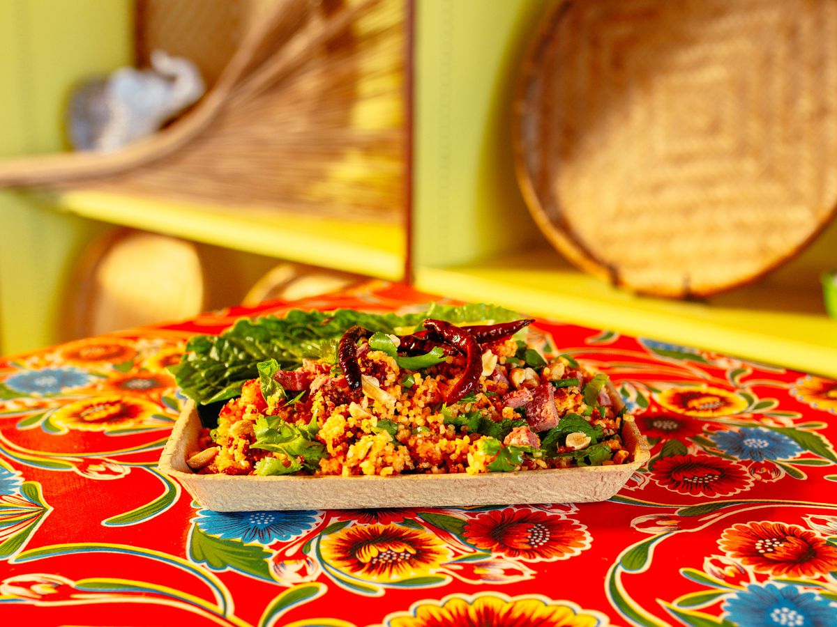 A tray of rice and vegetables.