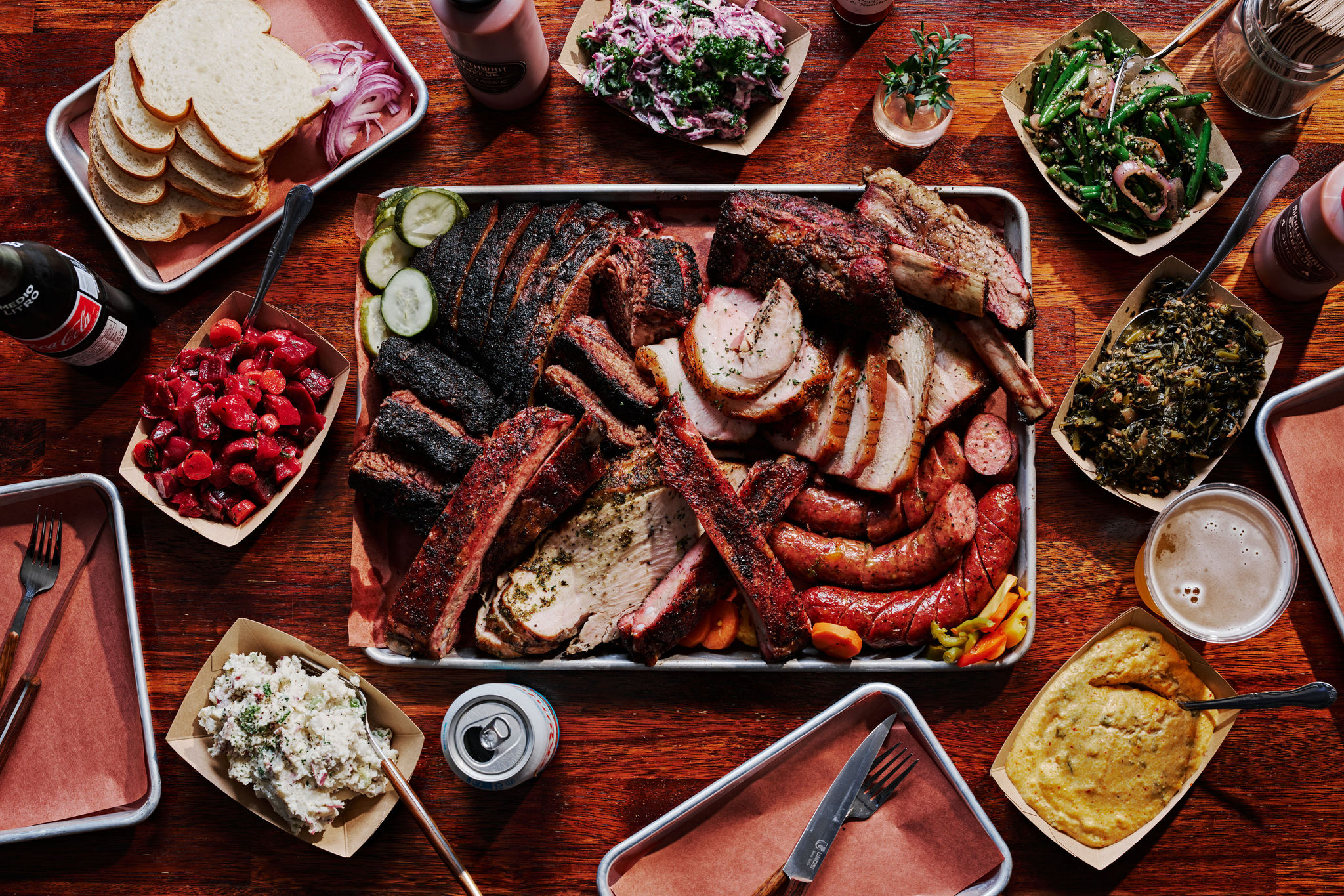 A spread of trays filled with barbecue from Micklethwait.