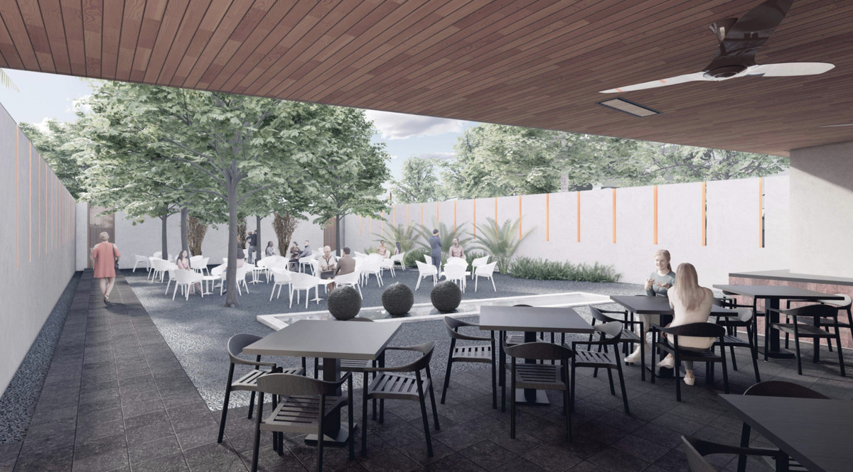 A rendering shows an outdoor dining area. The front part is covered, with a wood ceiling and fans. The other half is open, with trees for shade and plants.