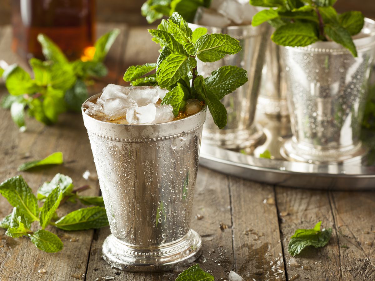 Silver julep glasses with mint.