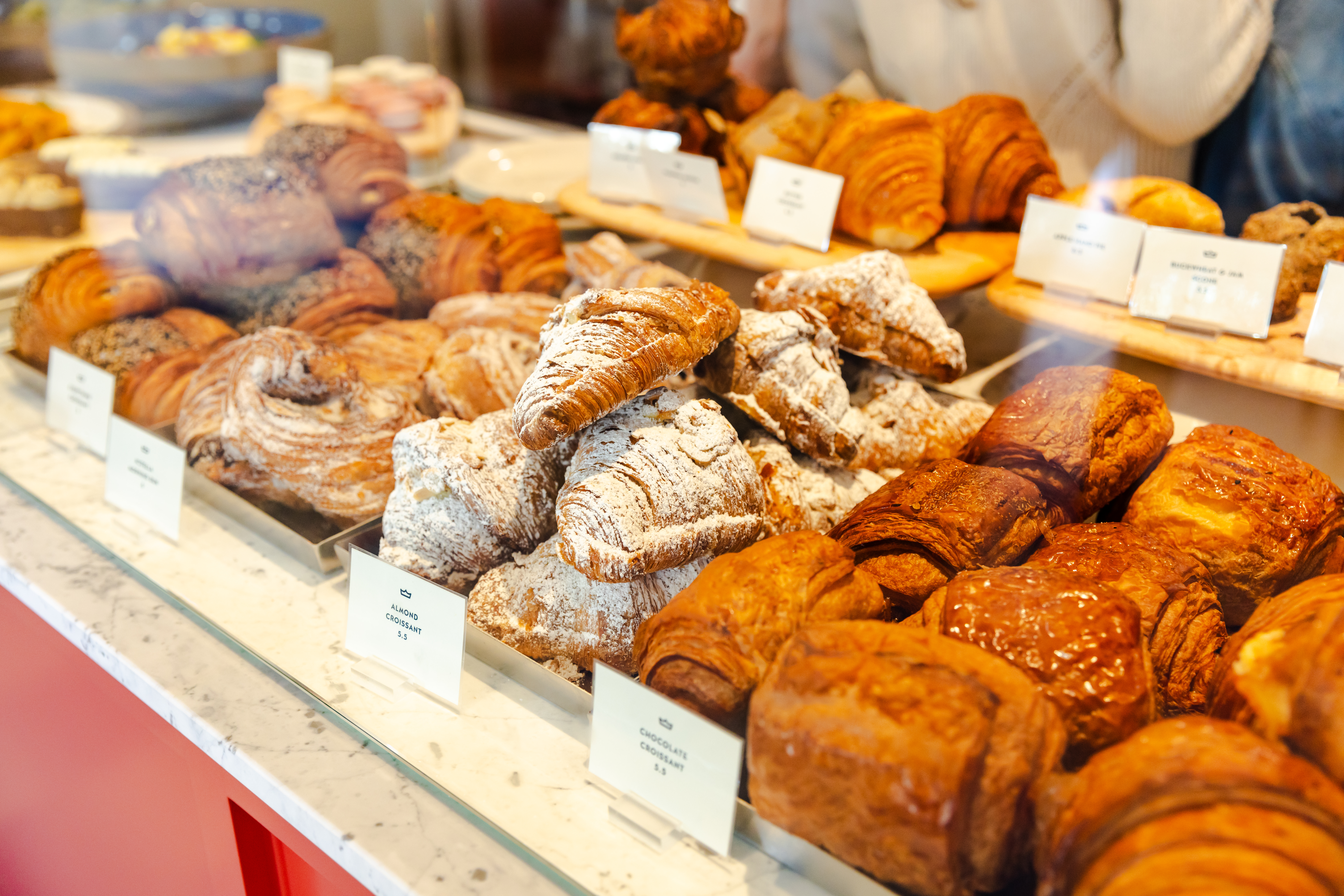 A deli counter of baked goods.